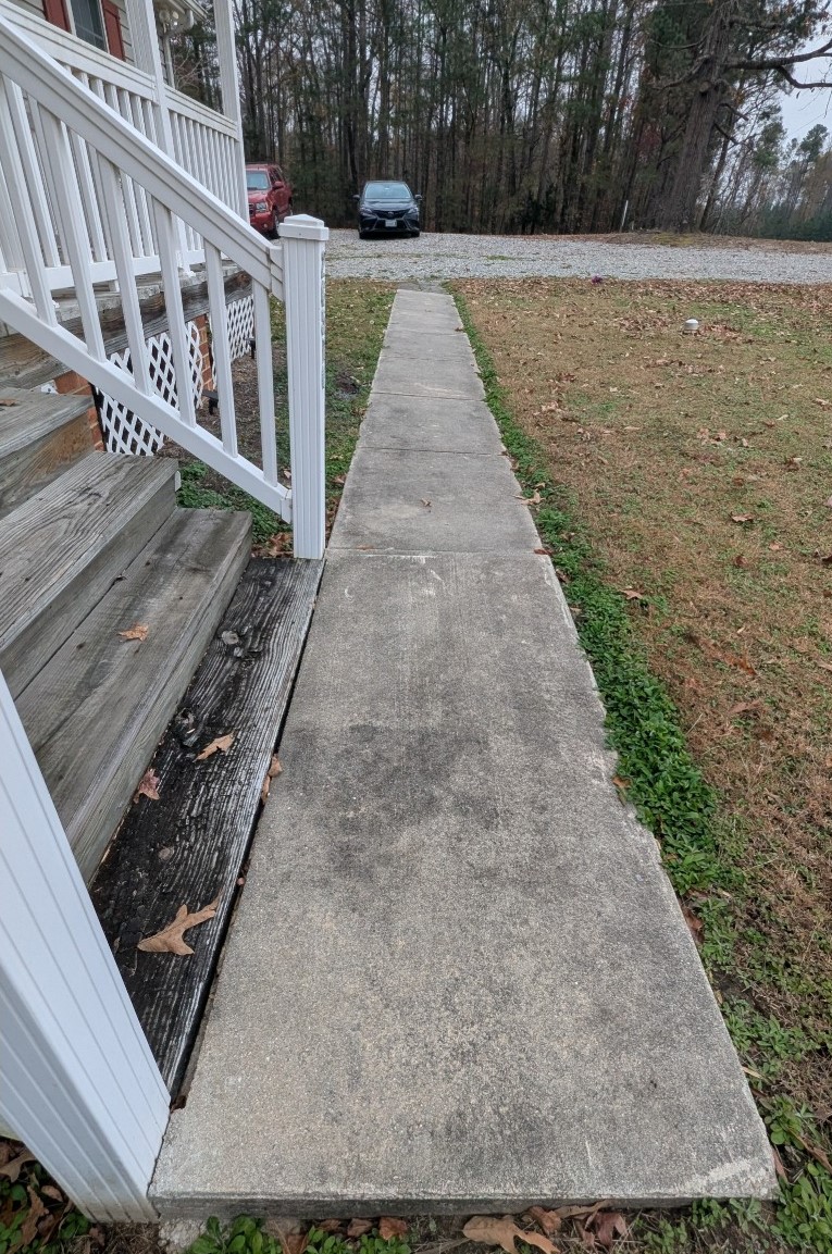 Walkway pressure washing before